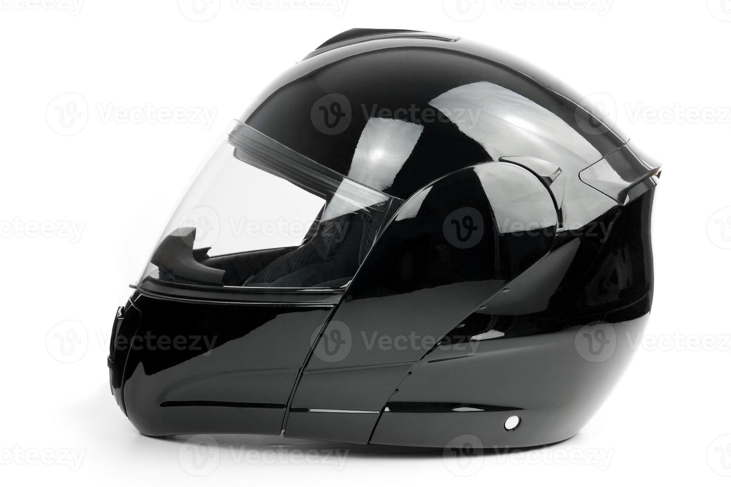 Black, shiny motorcycle helmet photo