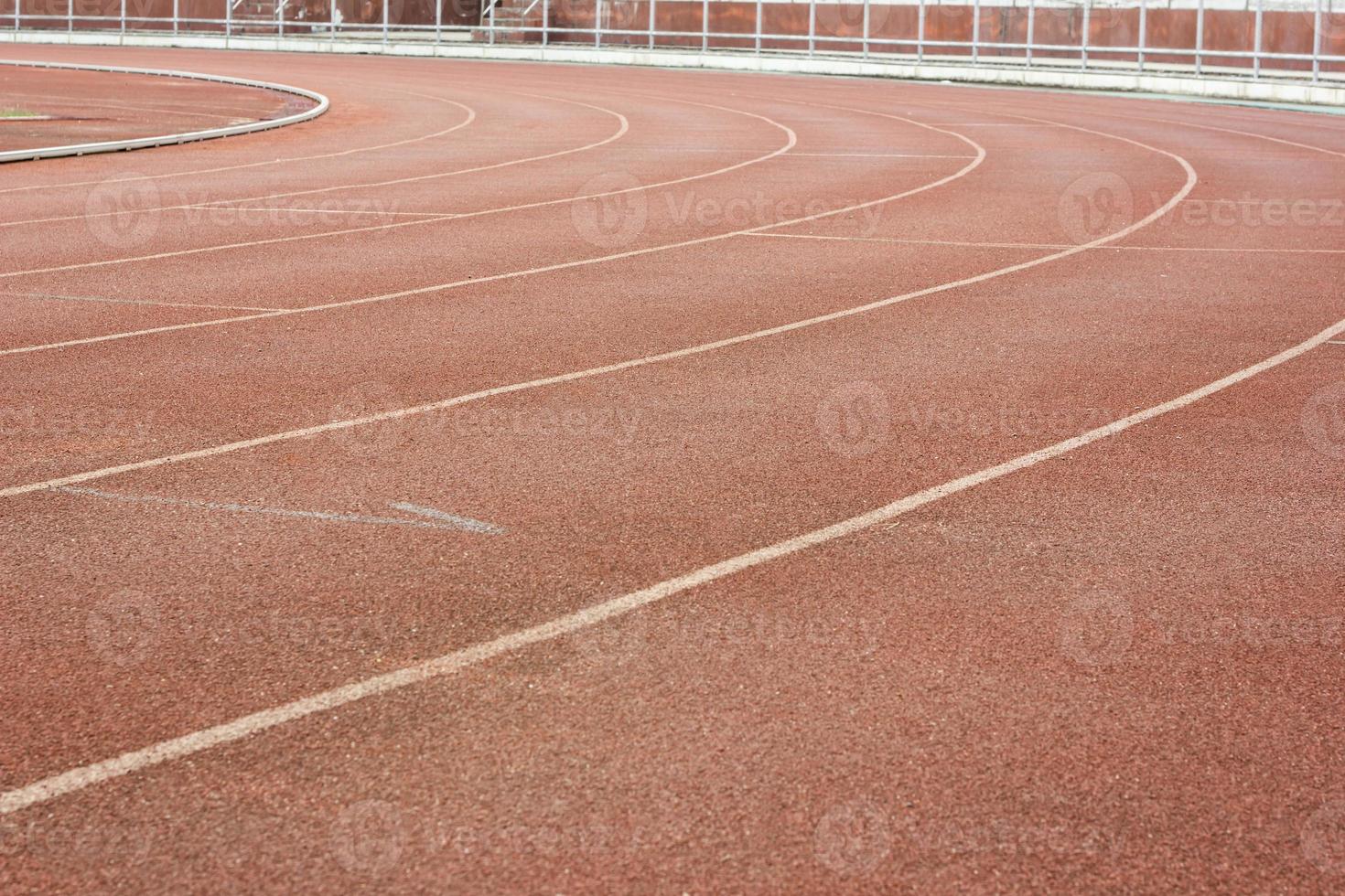 Athletics track in stadium photo