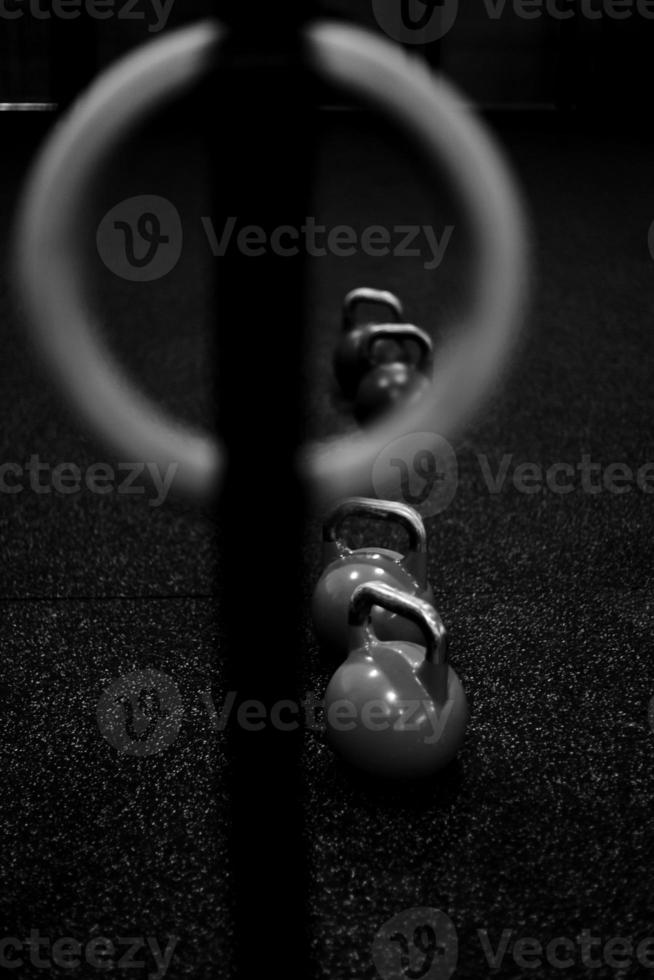 Rings and kettlebells in a gym gym 824560 Stock Photo at Vecteezy