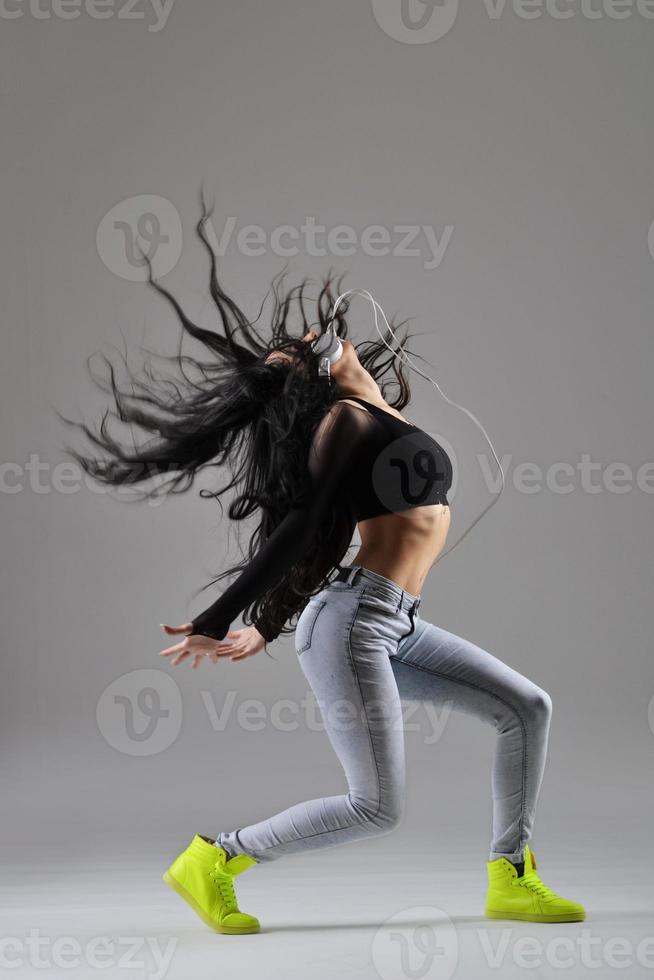 beautiful young woman dancing photo