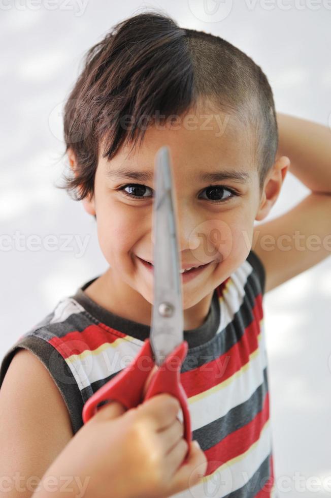 Kid cutting hair to himself with scissors, funny look 831645 Stock Photo at Vecteezy Kid cutting hair to himself with scissors, funny look 831645 Stock Photo at Vecteezy