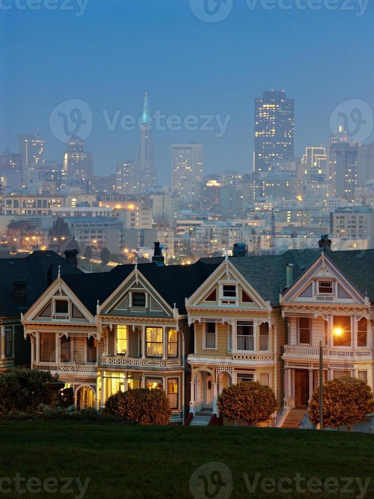 Landscape of Alamo square with cityscape in the background photo