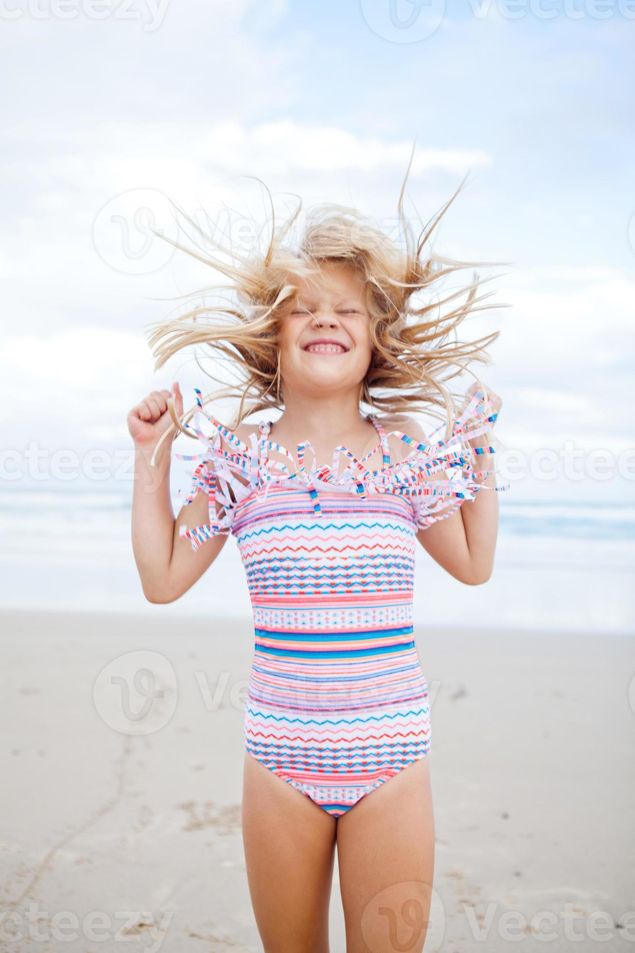 Young Girl On The Beach