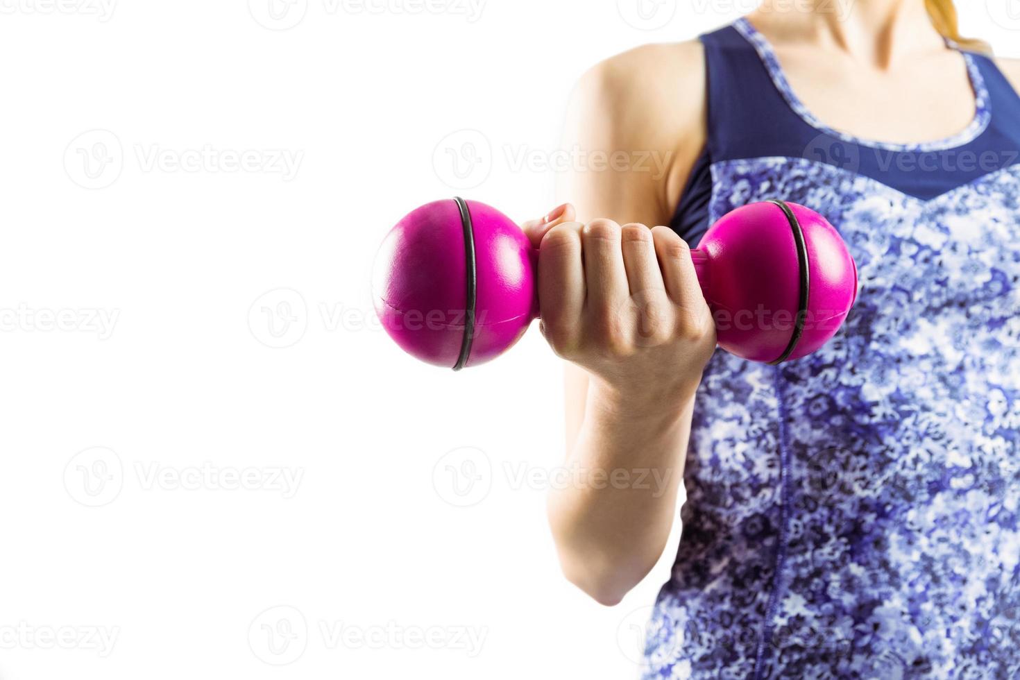 ajuste mujer levantando pesas rosa foto