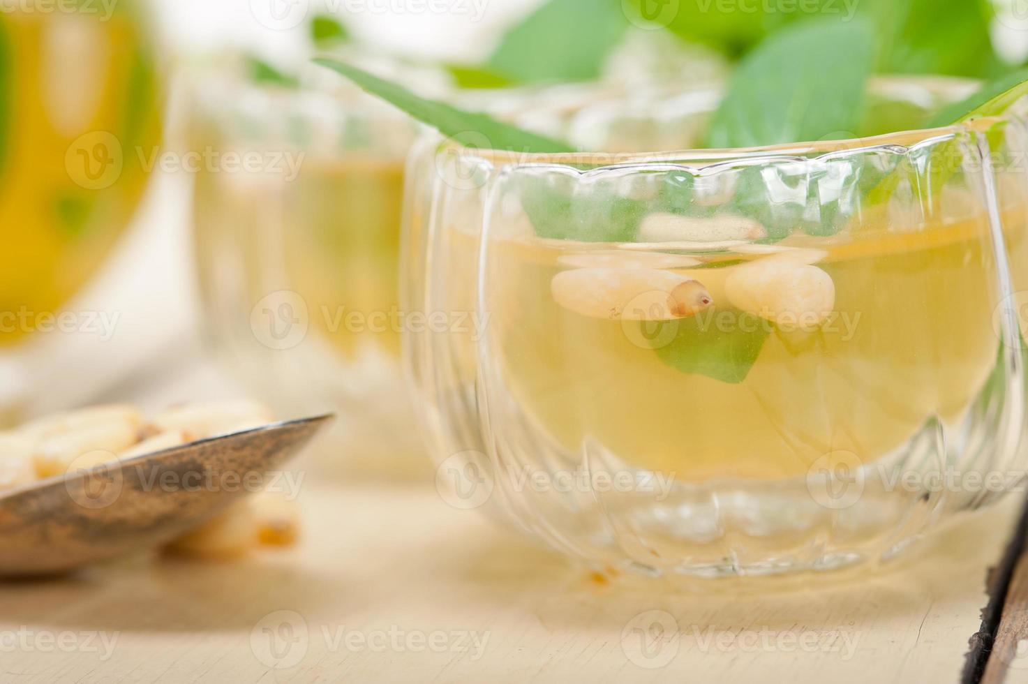 Arab traditional mint and pine nuts tea photo