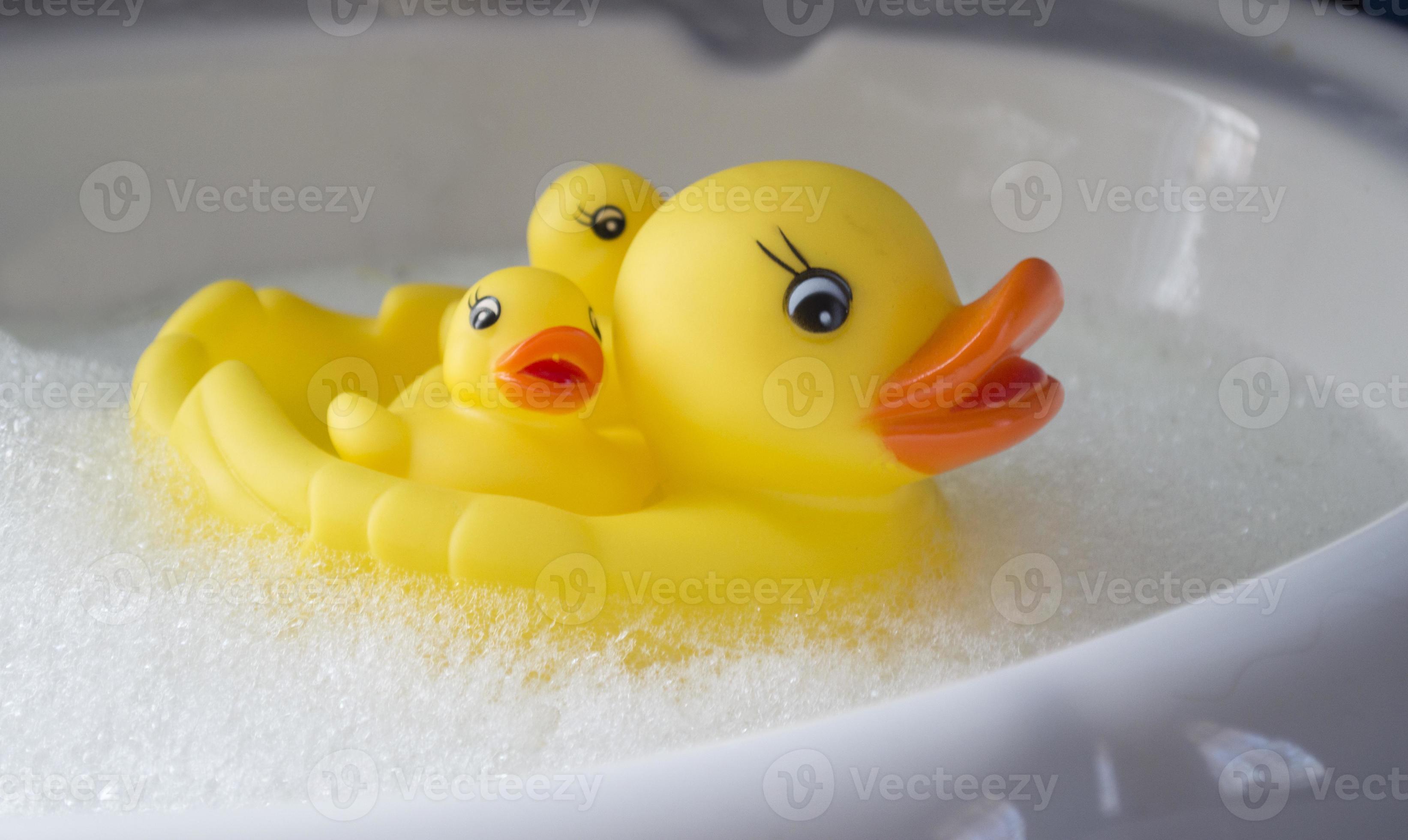 Family of rubber ducks in the bath with bubble bath 847981 Stock Photo