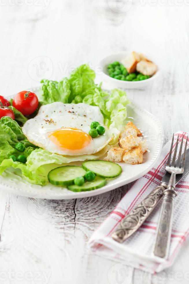 Breakfast with fried egg photo