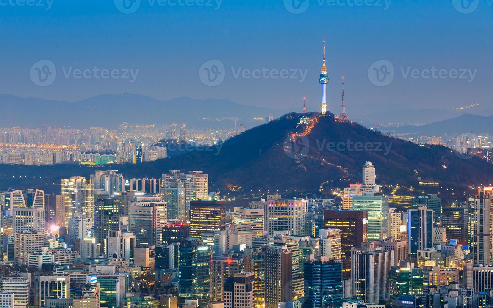 Seoul Tower overlooks a neon concrete jungle in South Korea photo