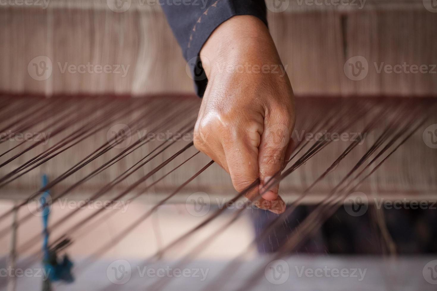 Process of weaving Thai Silk photo