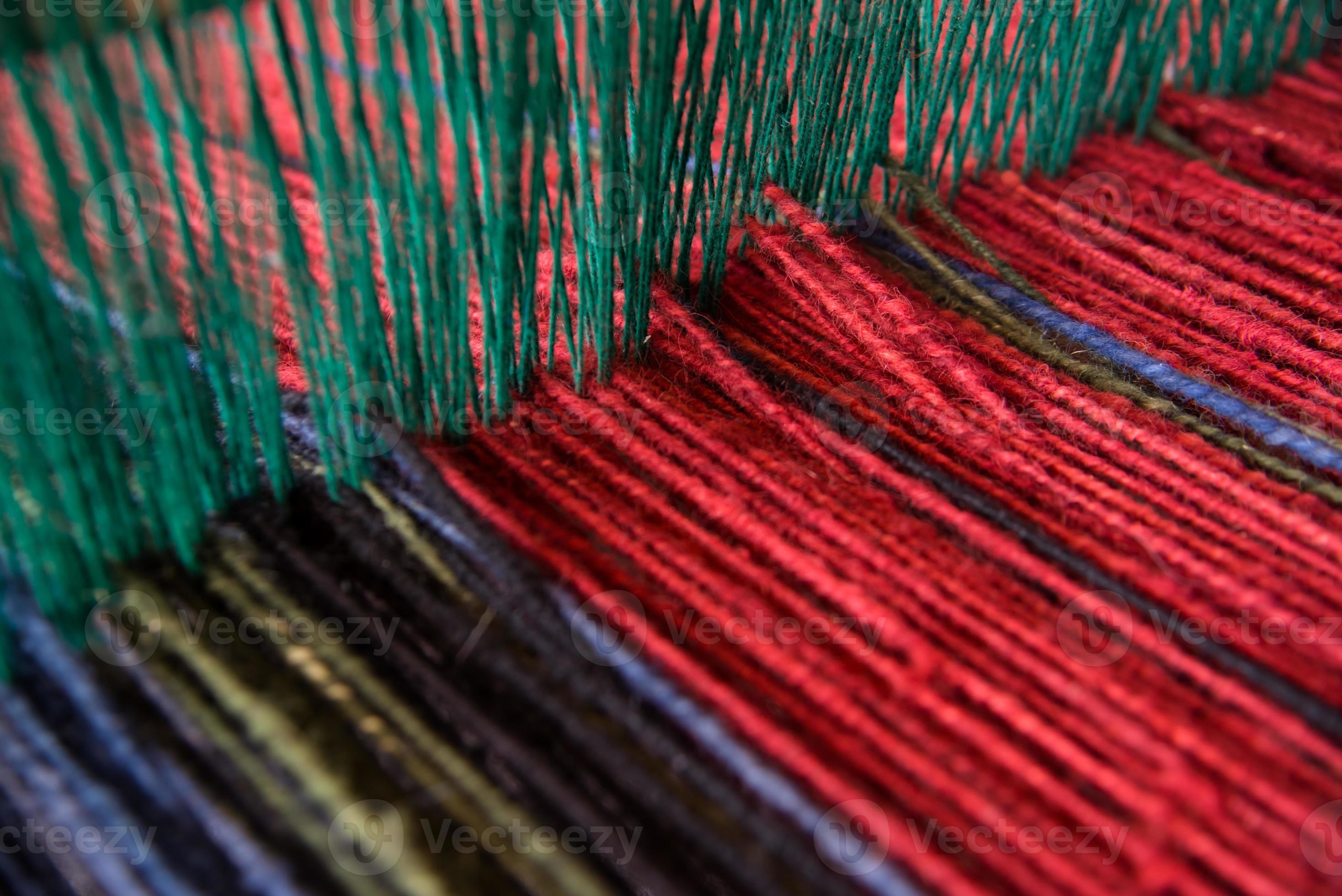 Wool yarn on loom photo