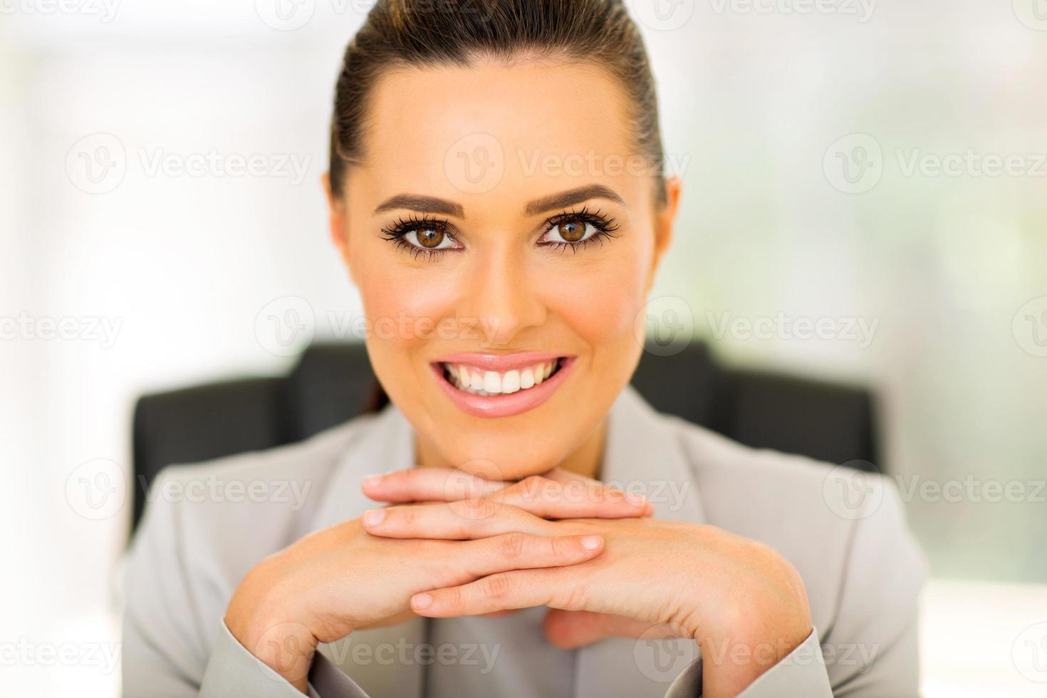 office worker sitting in office photo