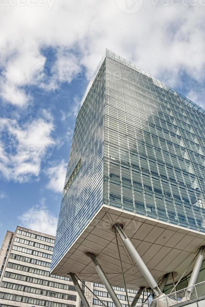 Glass office building on stilts. 872870 Stock Photo at Vecteezy