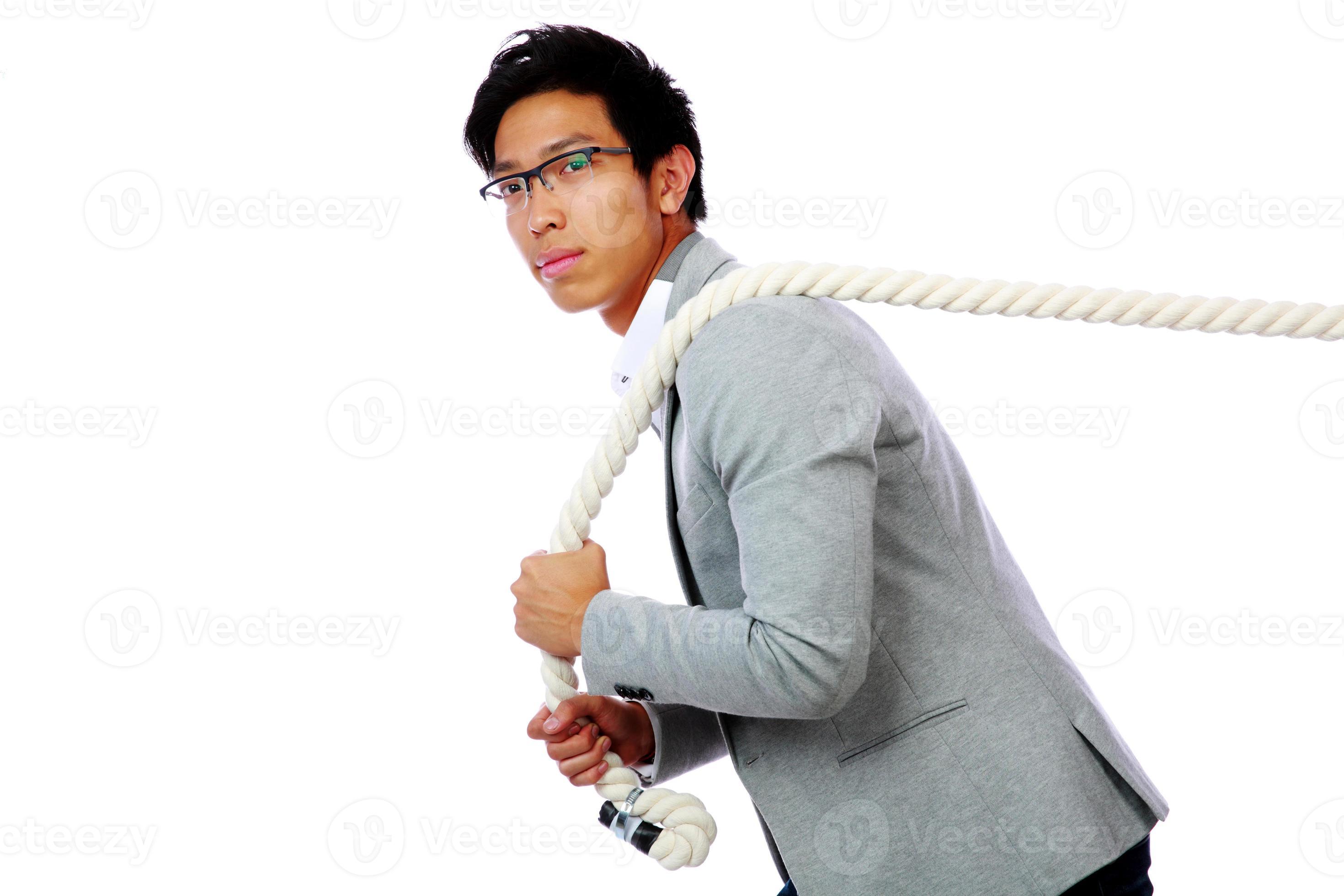 Portrait of a man pulling rope 874137 Stock Photo at Vecteezy