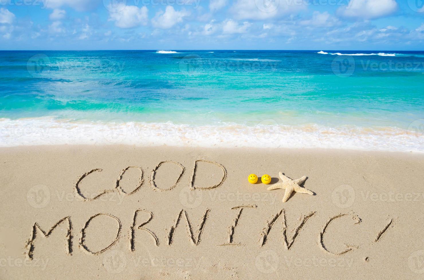 Sign "Good morning" on the beach photo