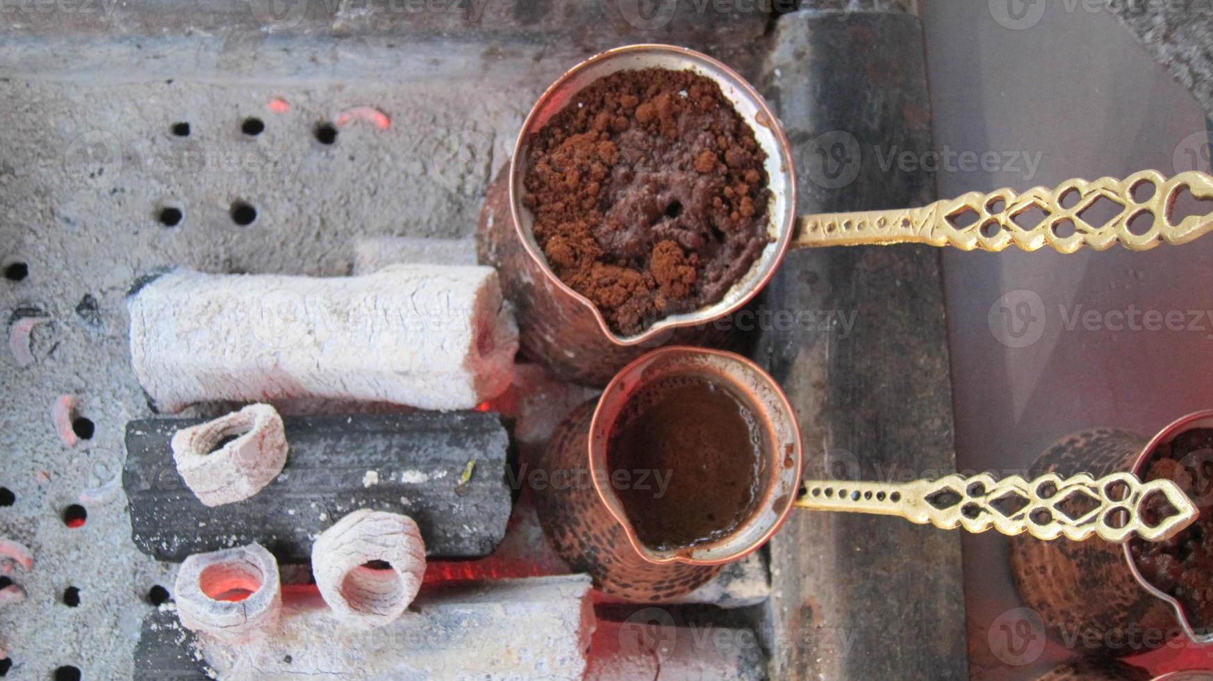 Copper pots with Turkish coffee 877921 Stock Photo at Vecteezy
