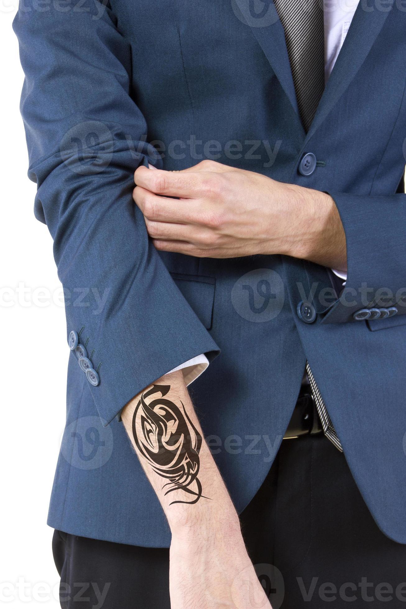 Hidden Tattoo on a Caucasian Businessman 879735 Stock Photo at Vecteezy