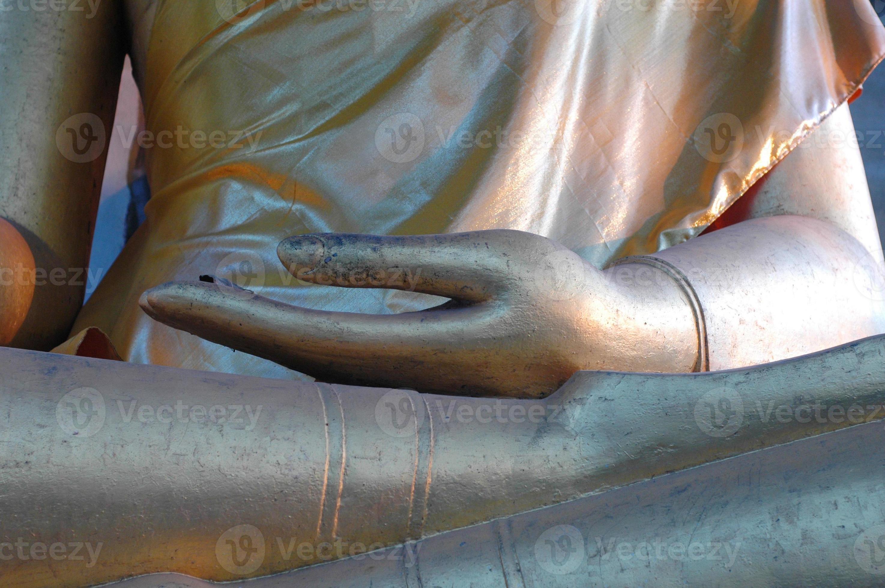 mano de Buda de oro foto