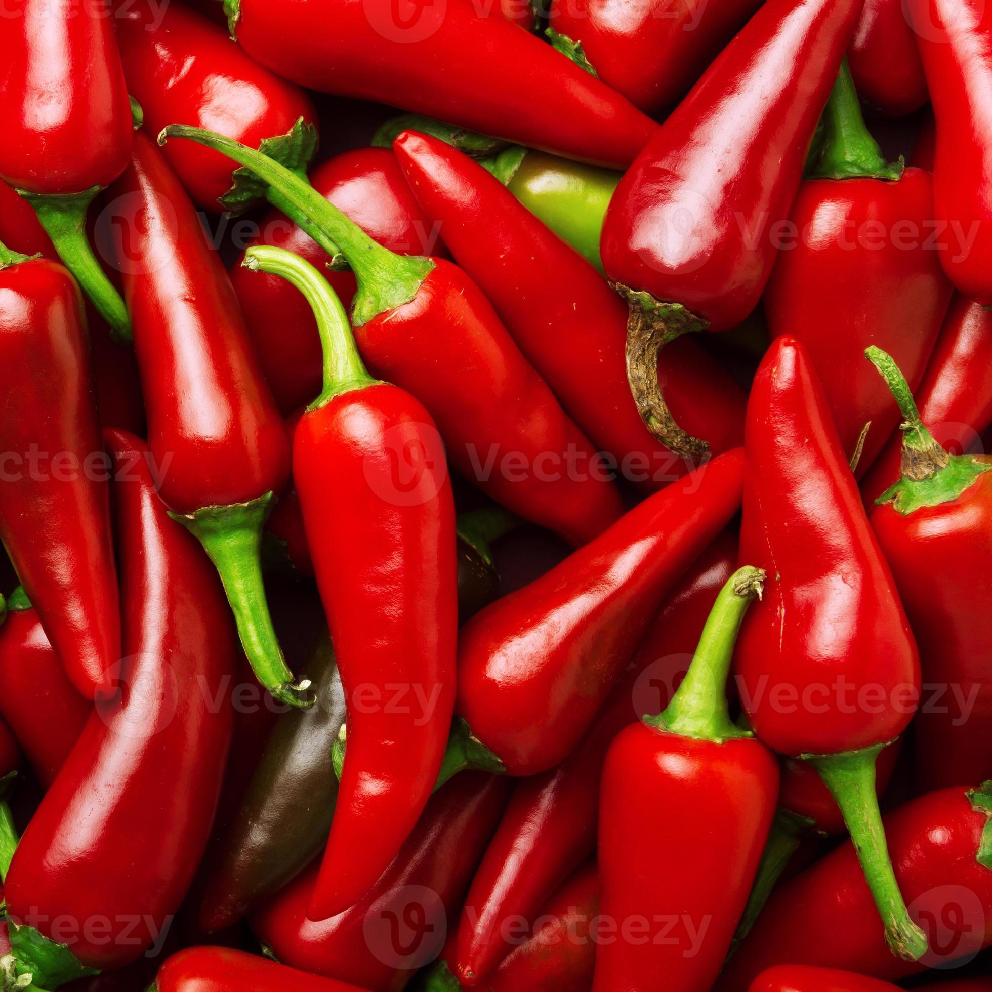 Heap Of Ripe Big Red Peppers 883132 Stock Photo at Vecteezy