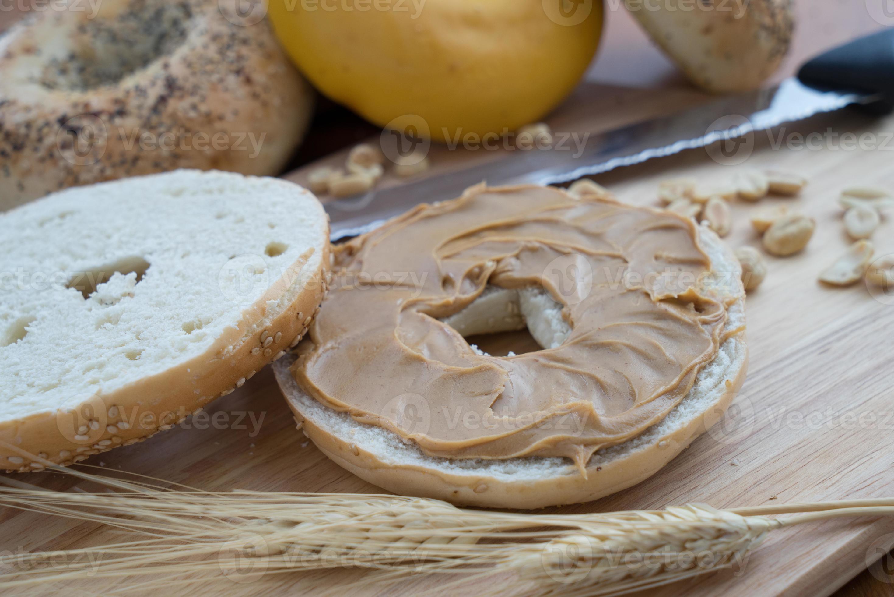 Bagel with Peanut Butter 883526 Stock Photo at Vecteezy