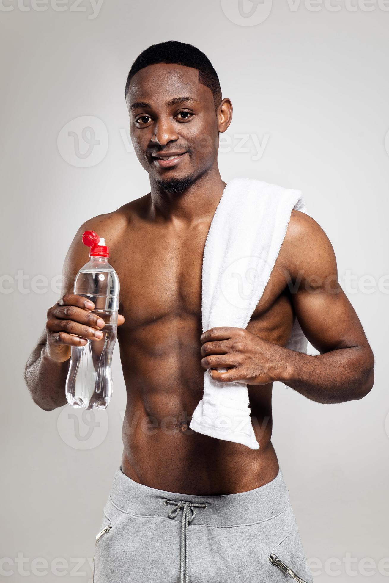 Premium Photo  Exercise black man and water bottle for workout