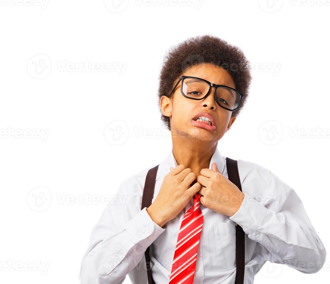 African American teenager unties his tie photo