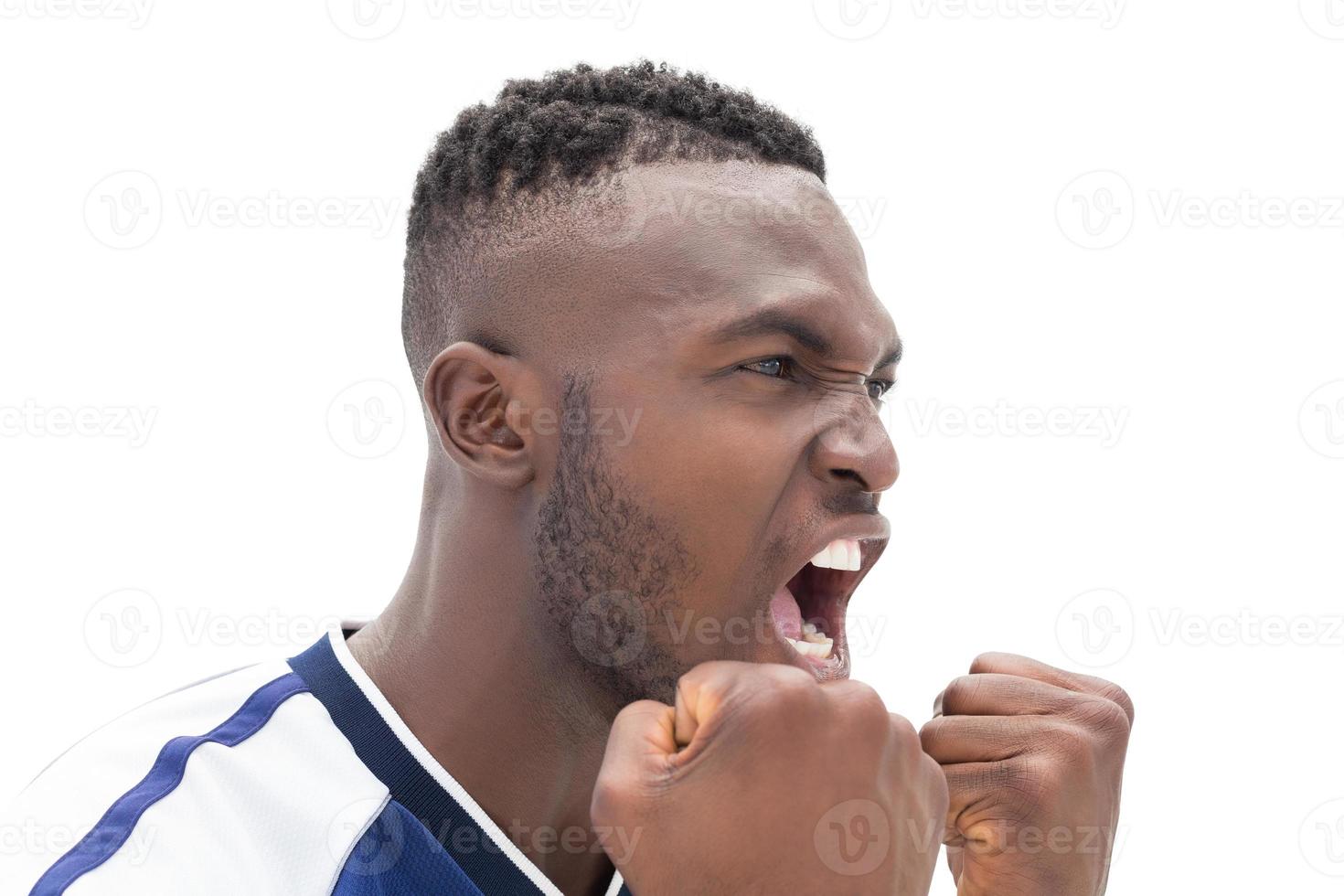 Close up of a football player shouting photo