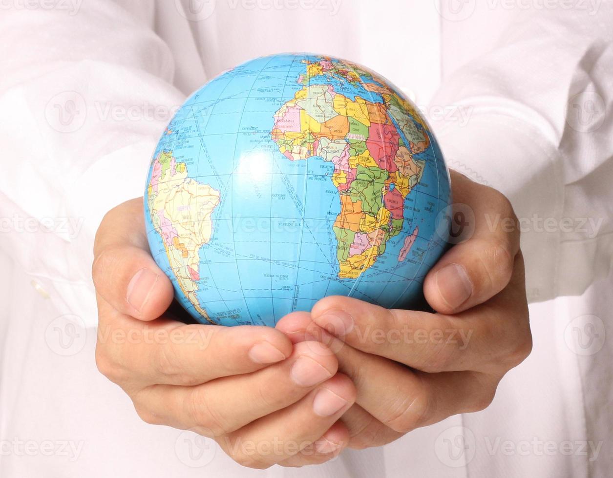 Globe ,earth in  hand photo