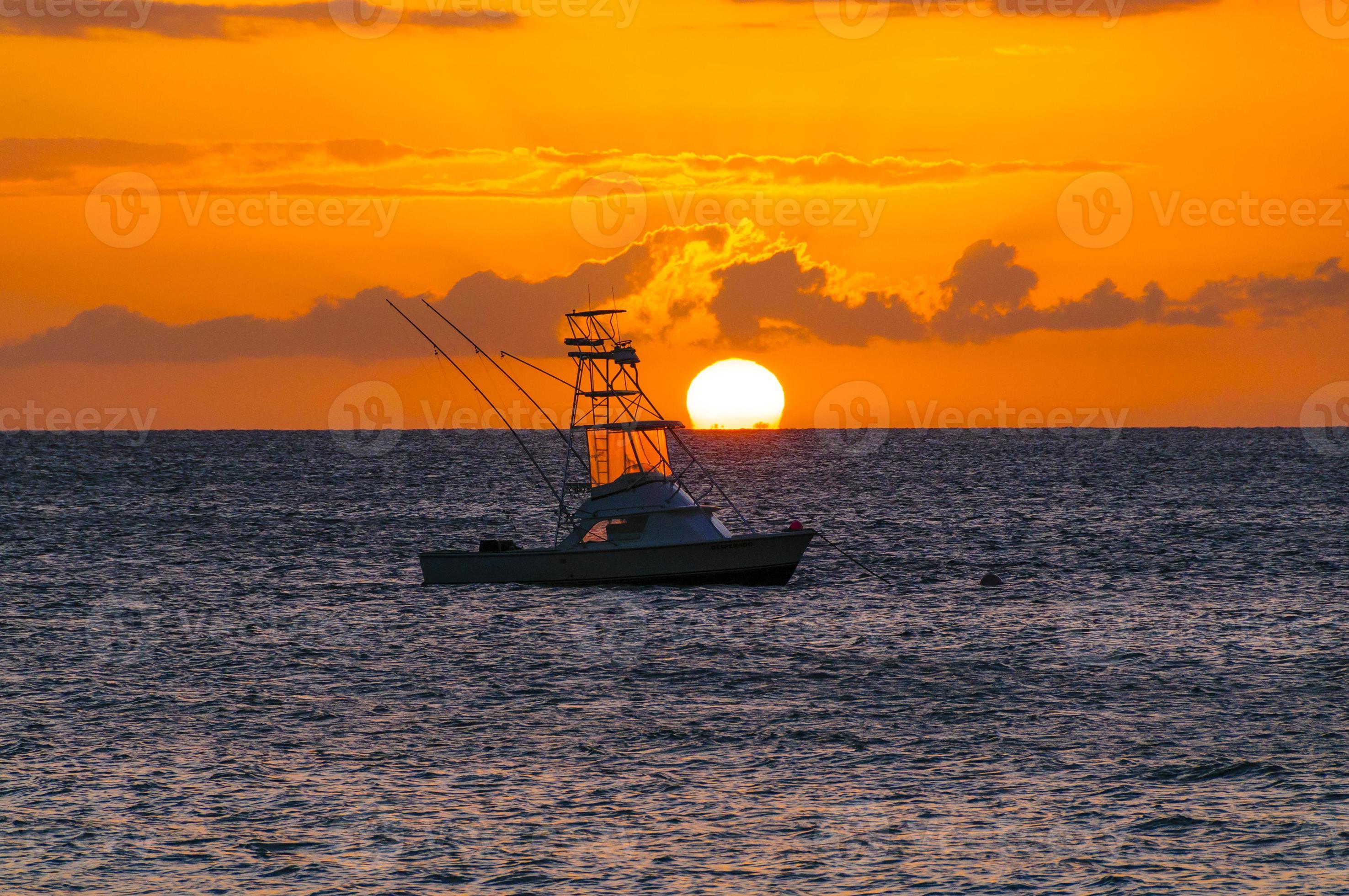 Beautiful Sunset Behind Sport Fishing Boat On Maui Hawaii Usa Stock Photo Beautiful Sunset Behind Sport Fishing Boat On Maui Hawaii Usa Stock Photo