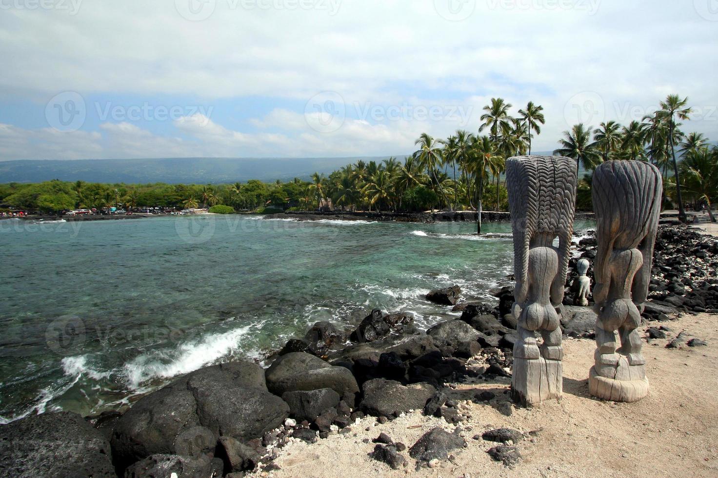 Tiki Statues At Kona Beach photo
