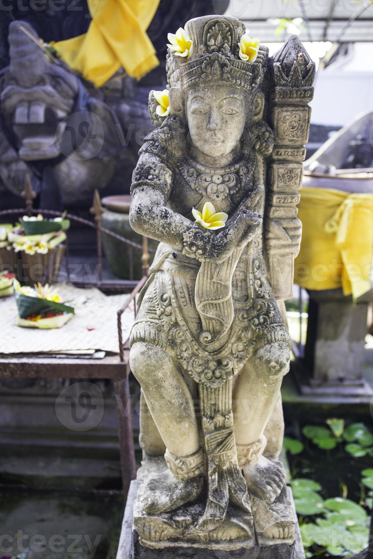 Statue Into A Hindu Temple In Jimbaran Bali Indonesia 890769 Stock Photo At Vecteezy