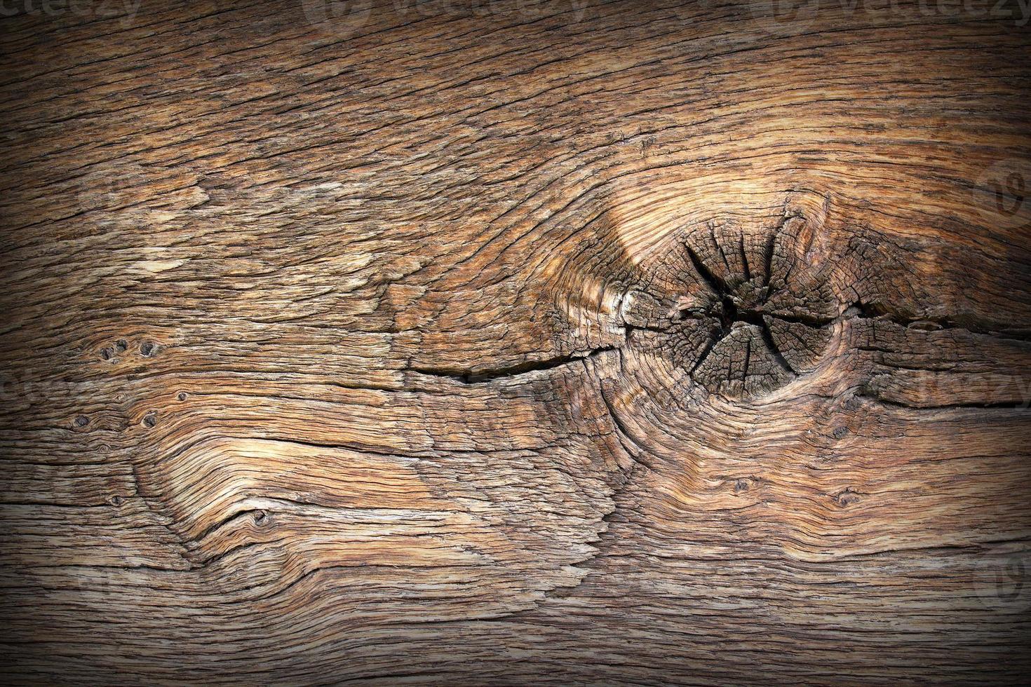 knot on ancient wood plank photo