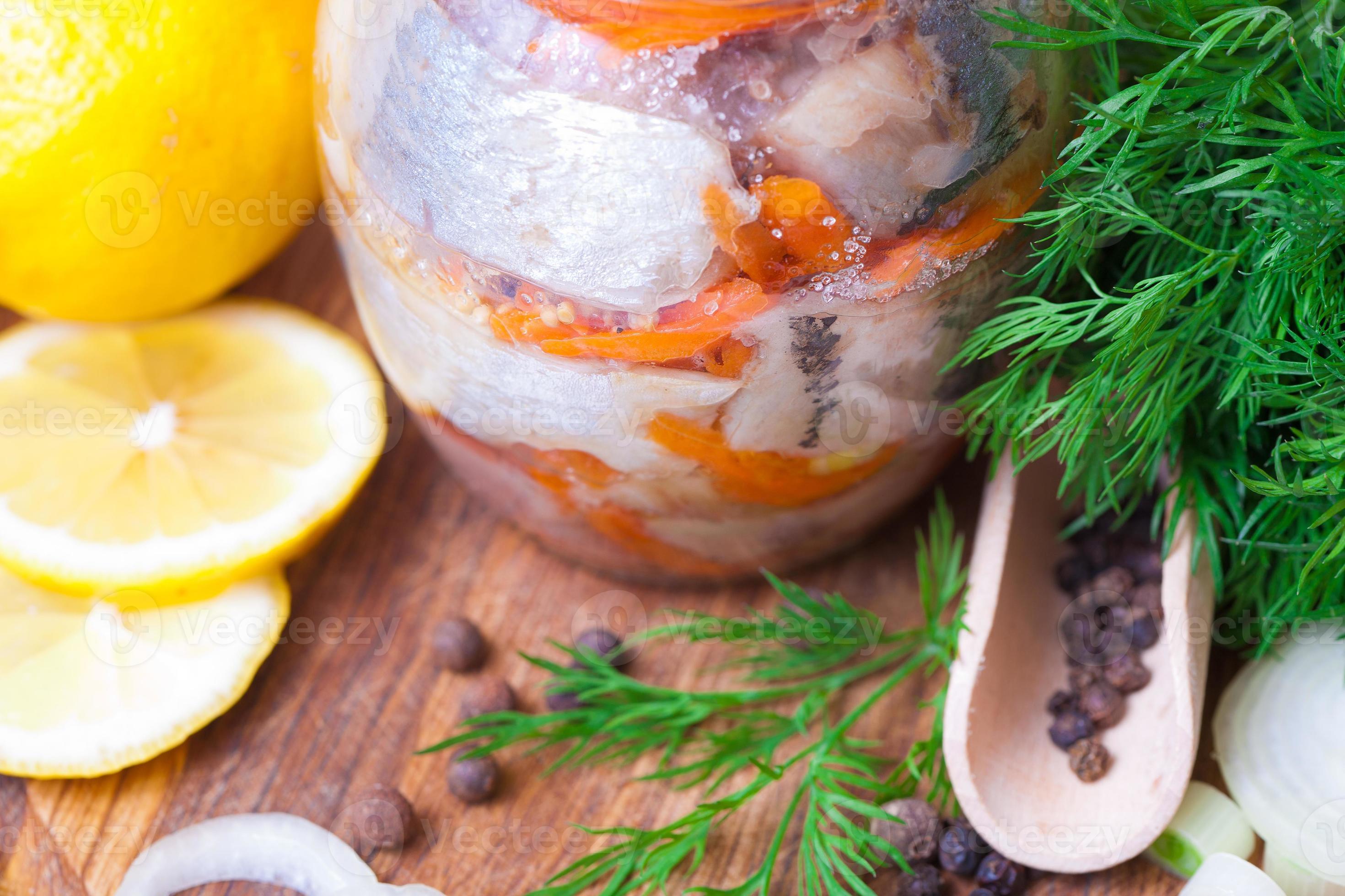 Marinated herring in a jar 891318 Stock Photo at Vecteezy