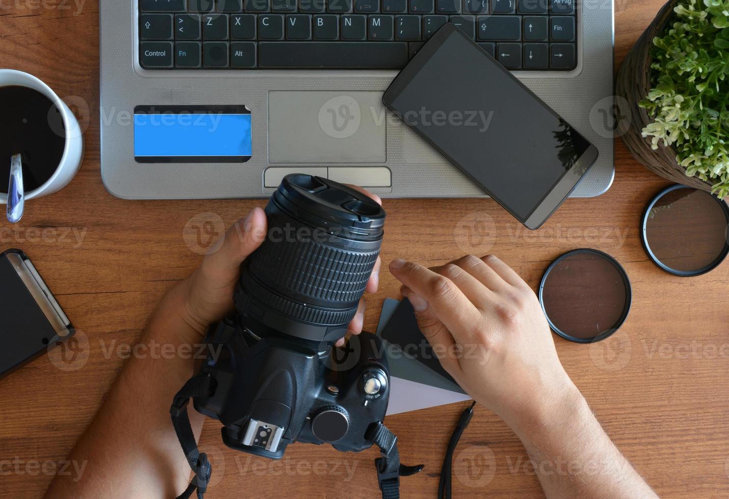 desktop with photography equipment photo