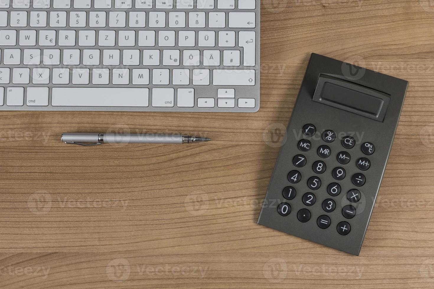 Keyboard and calculator on Desktop photo