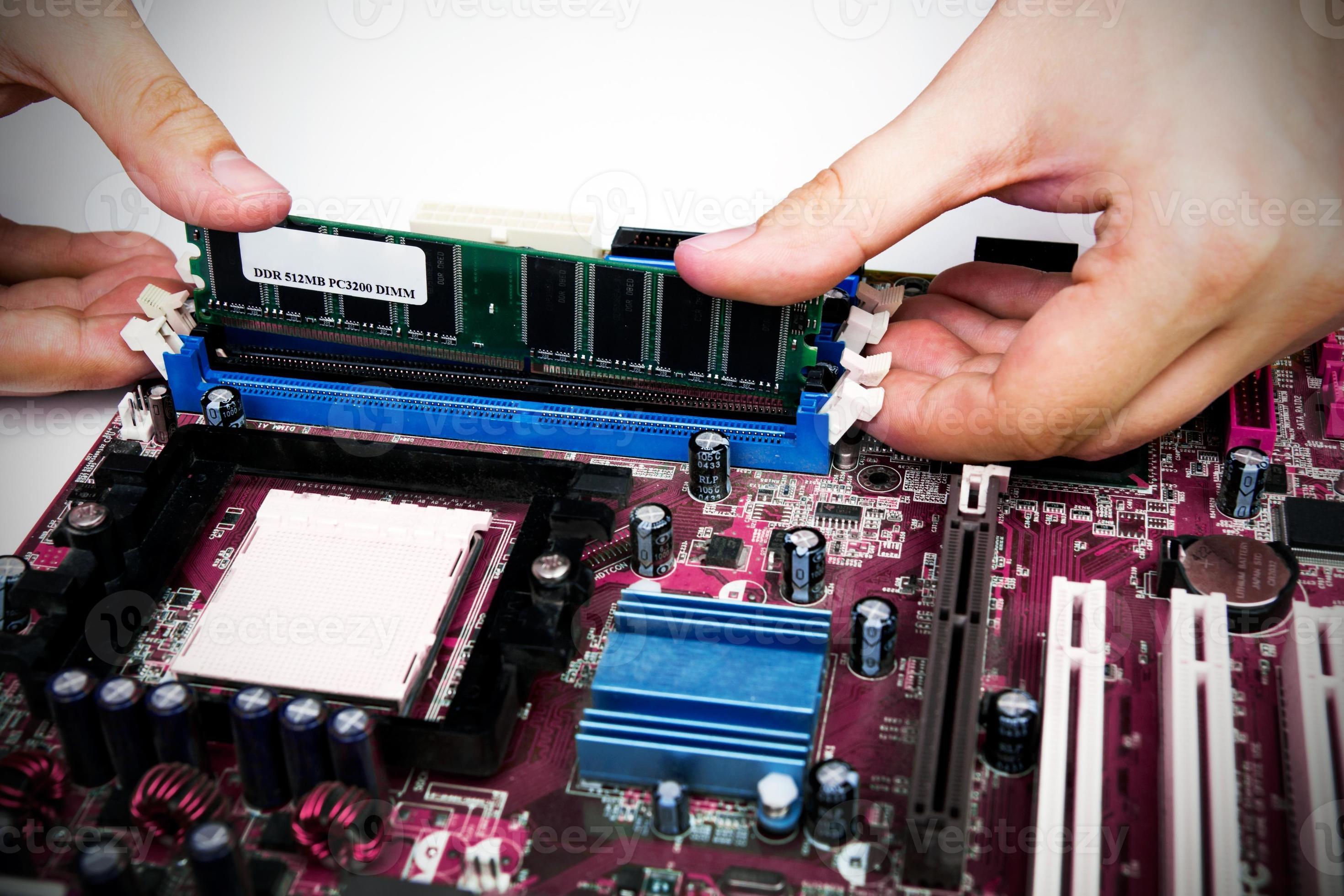 Man Installing Memory PC Motherboard RAM Upgrade 895785 Stock Photo At man-installing-memory-pc-motherboard-ram-upgrade-895785-stock-photo-at