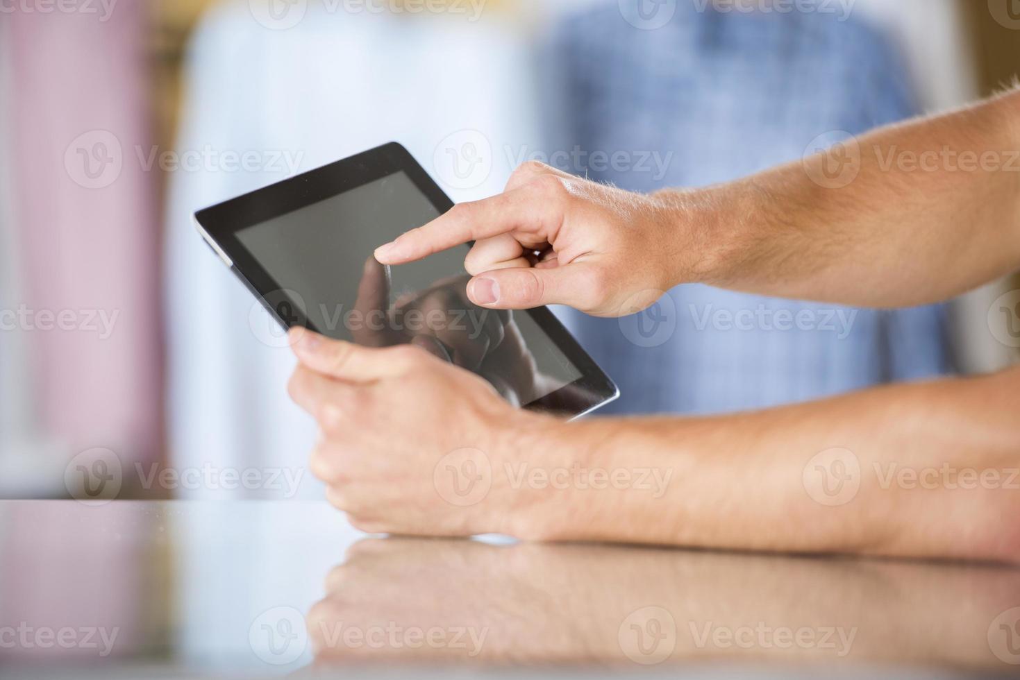 Man with tablet photo