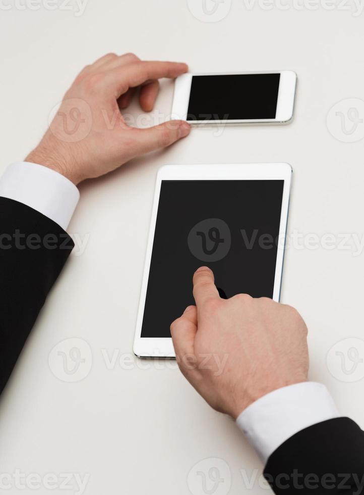 businessman working with tablet pc and smartphone photo