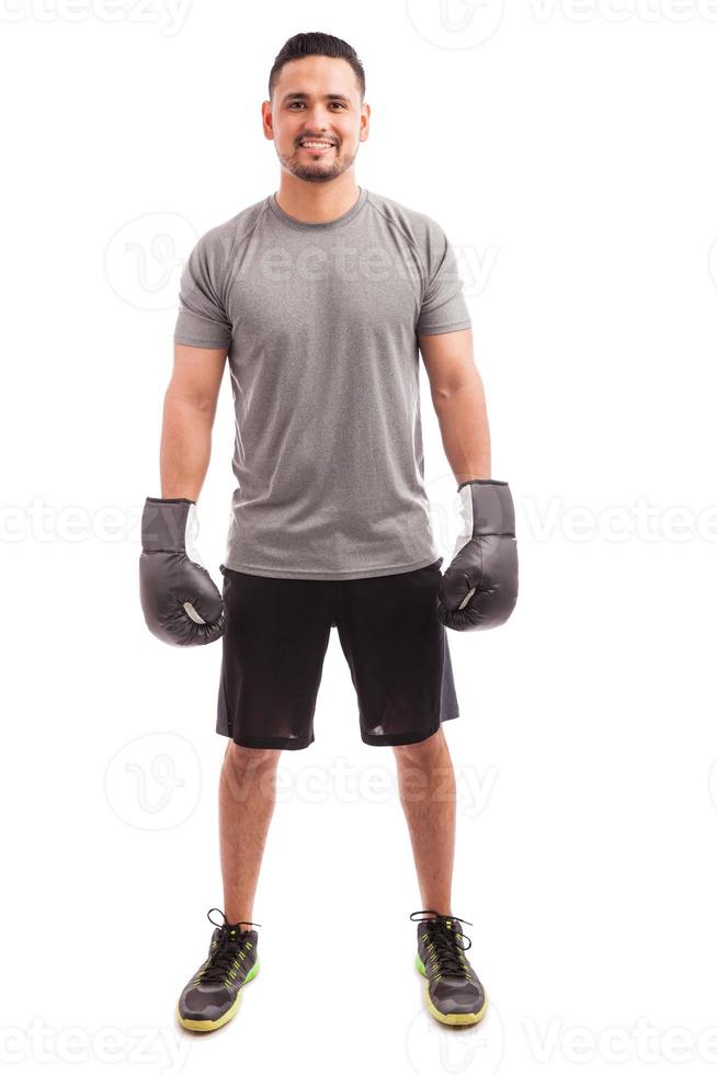 Young man enjoying boxing practice photo