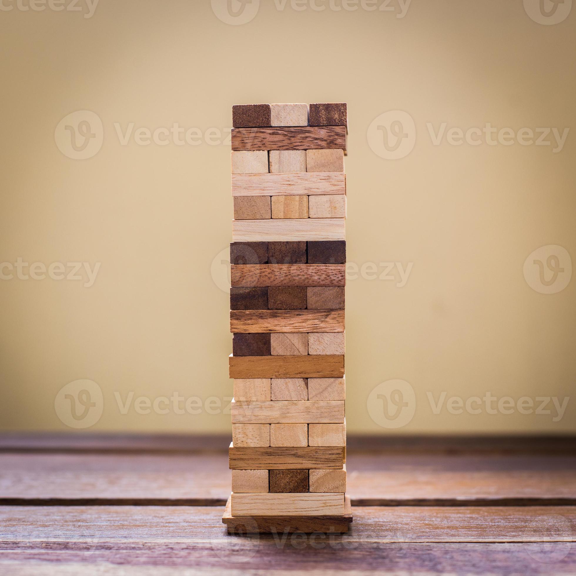 Wood block tower game for children. 906117 Stock Photo at Vecteezy