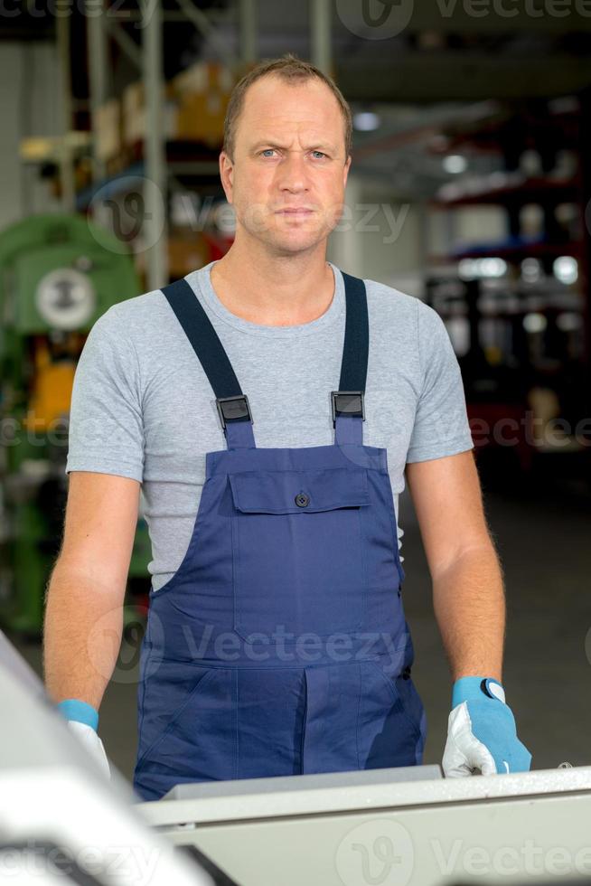 young worker in factory photo