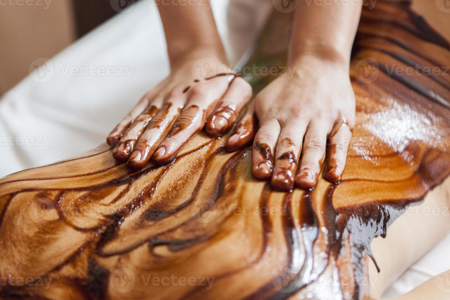 masaje con chocolate caliente foto