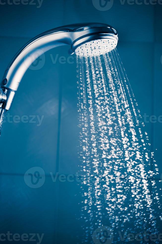 refreshing shower with water stream photo