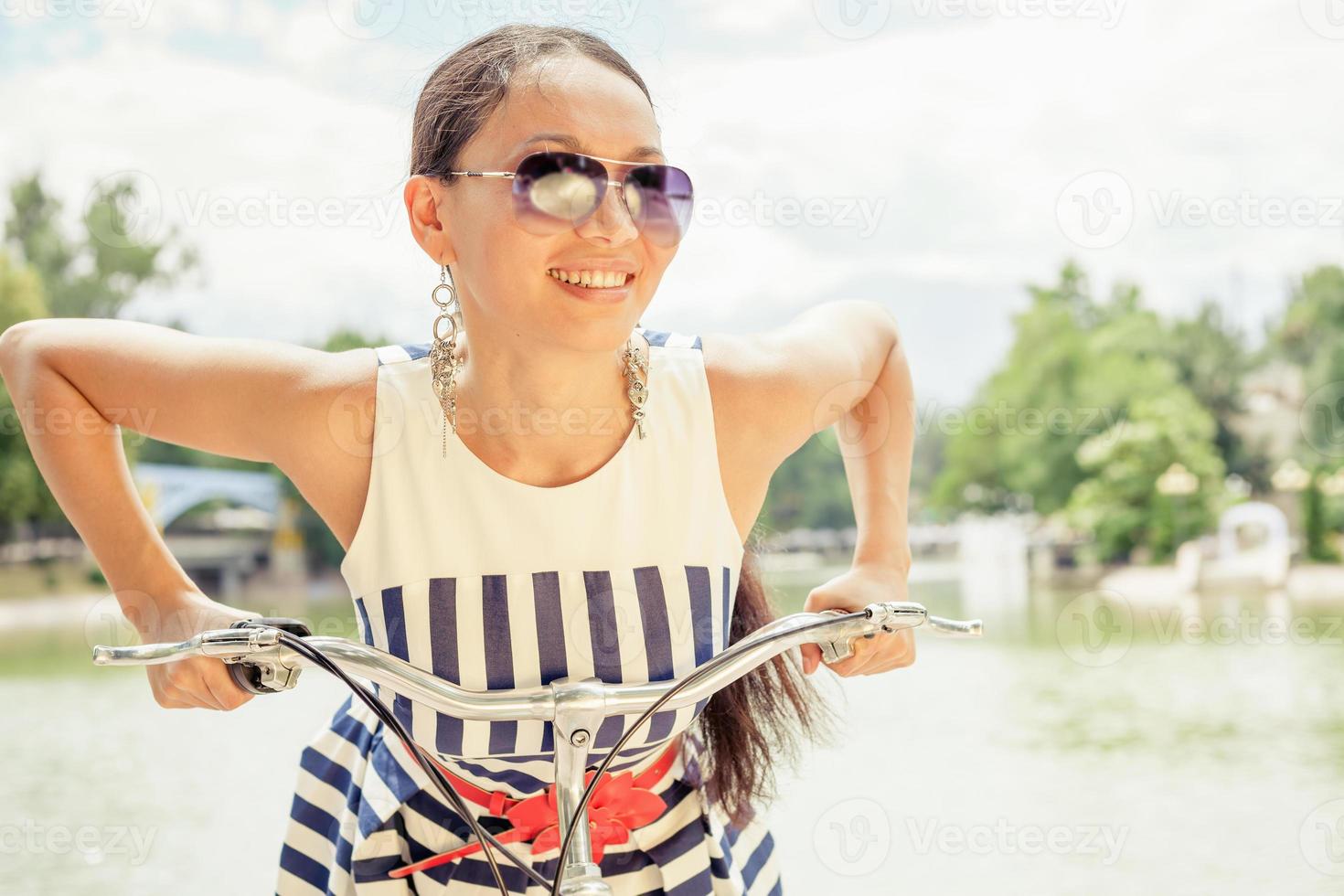 Delight and enjoyment asian woman travel to Paris by bicycle photo