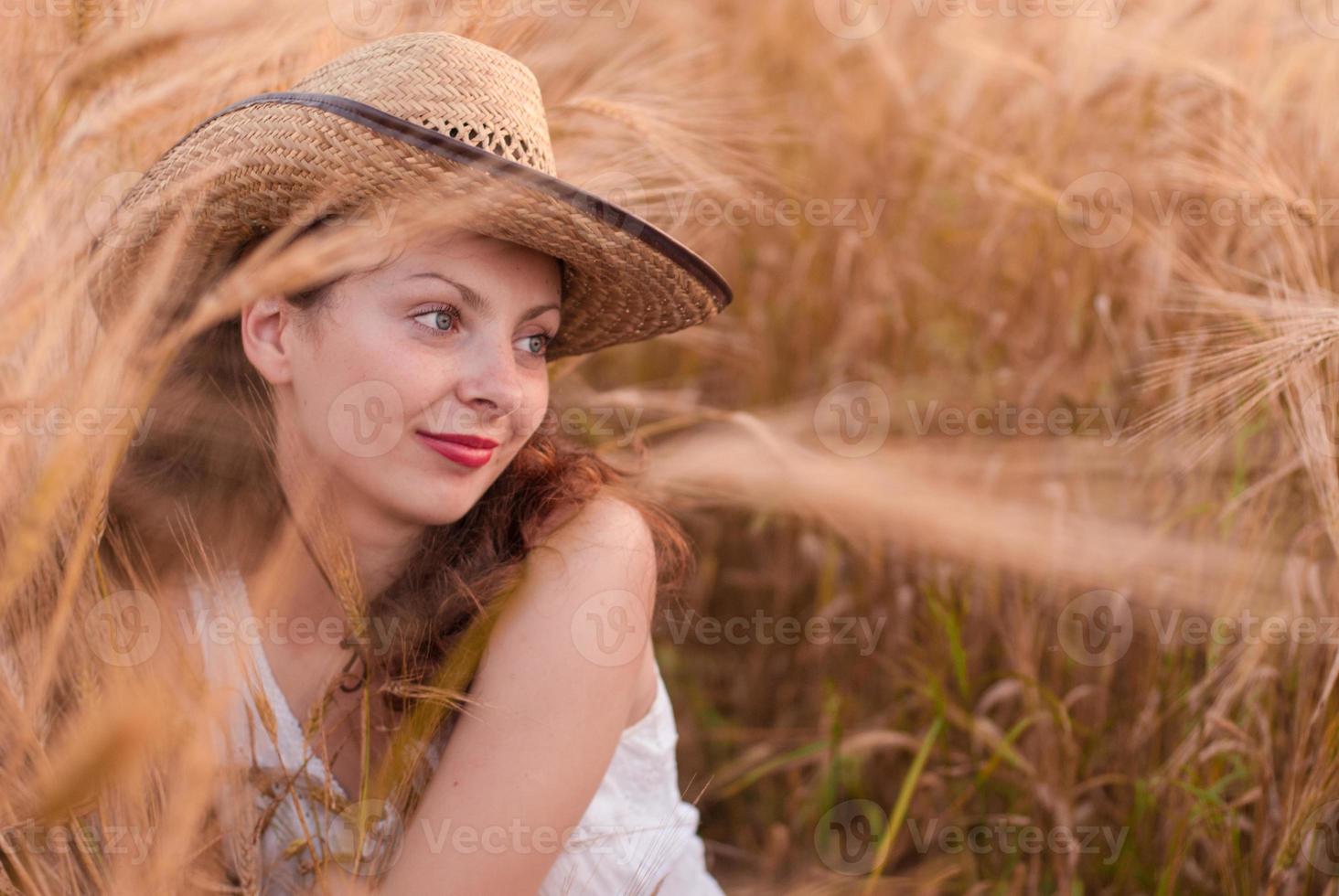 Woman in the wheat field photo