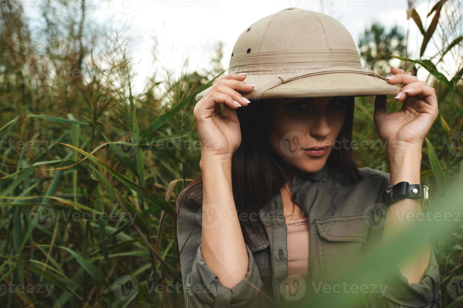 safari woman in swamp photo
