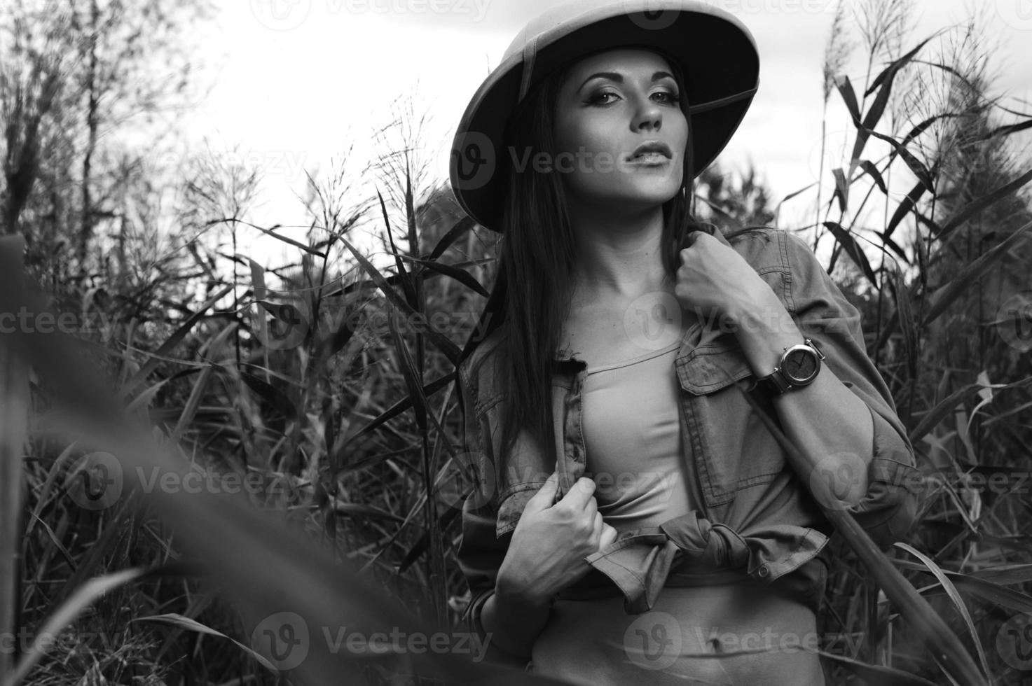 safari woman in swamp black and white photo