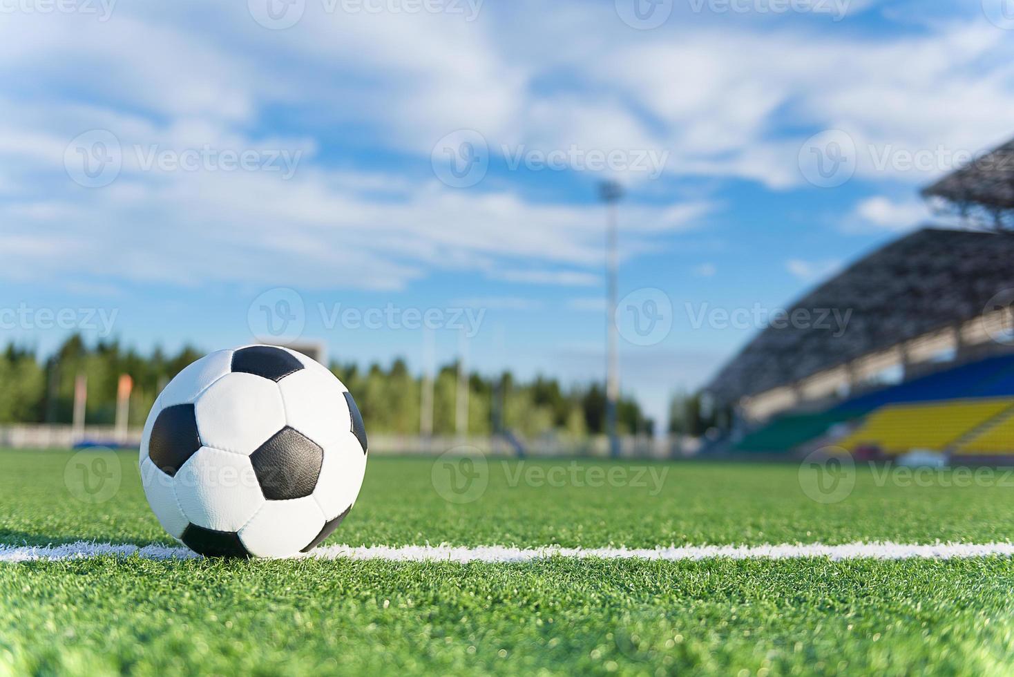 Football ball on white line photo