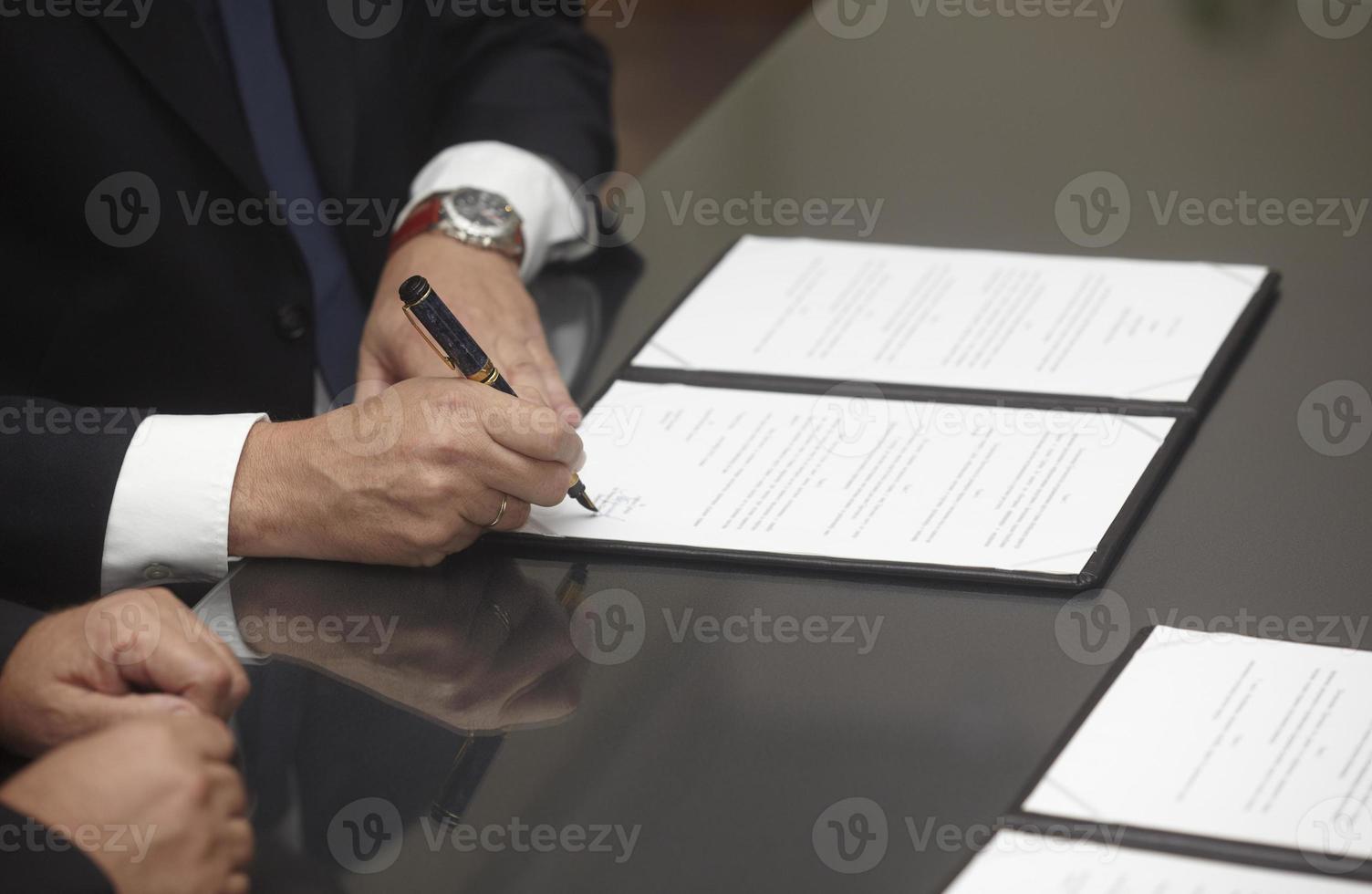 signature signing contract office business photo