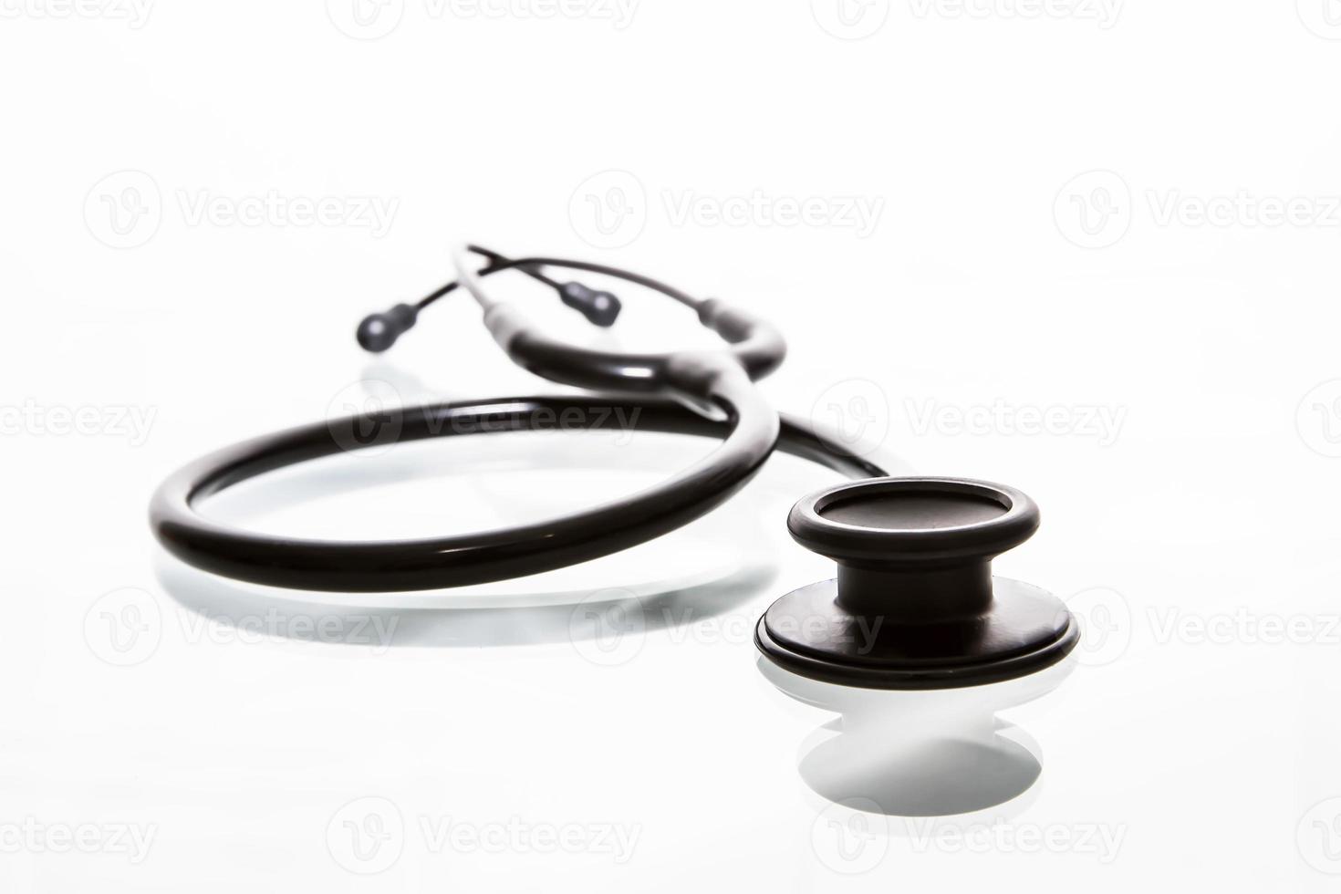 Black stethoscope on isolated background 930806 Stock Photo at Vecteezy