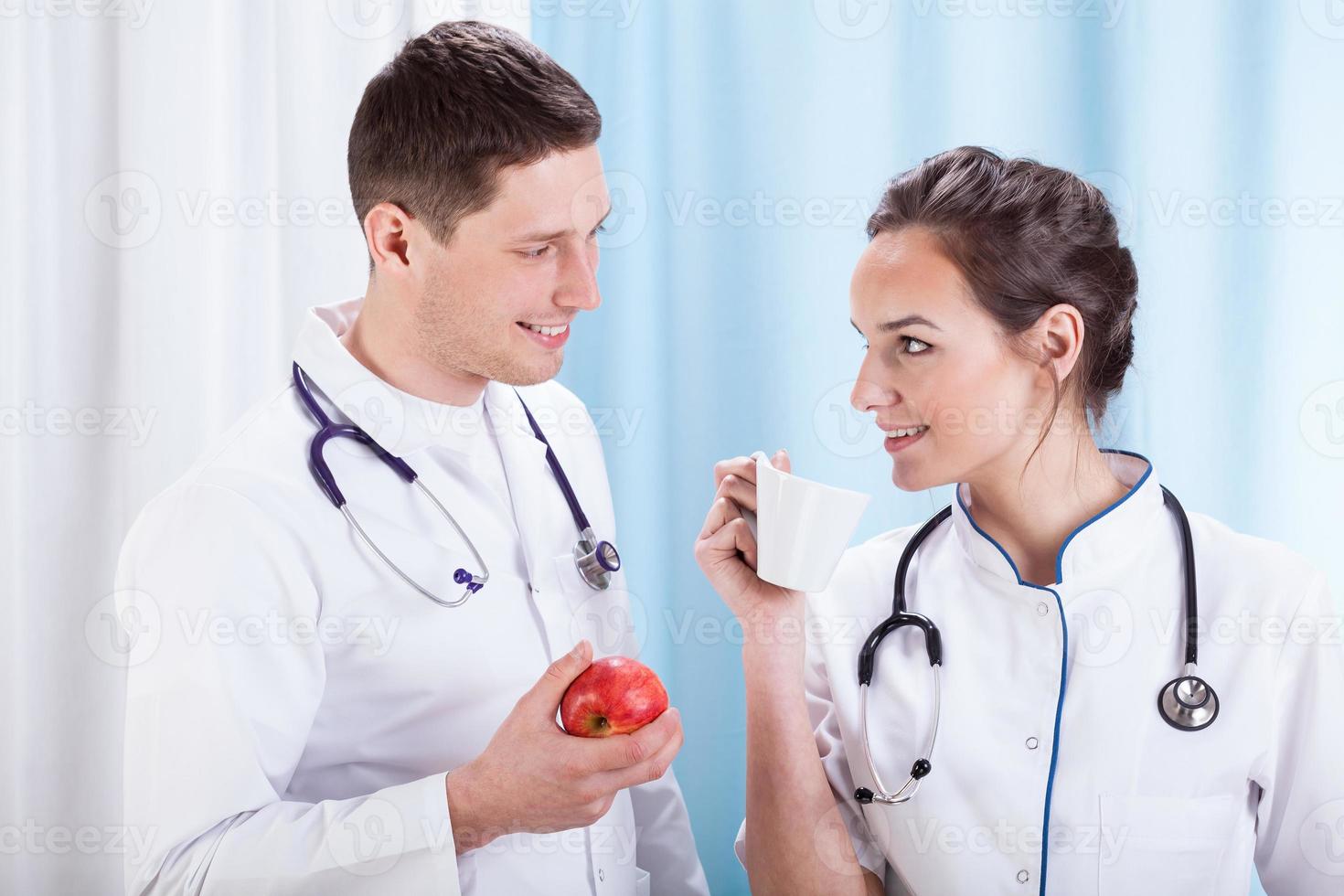 Doctors having lunch time 933256 Stock Photo at Vecteezy